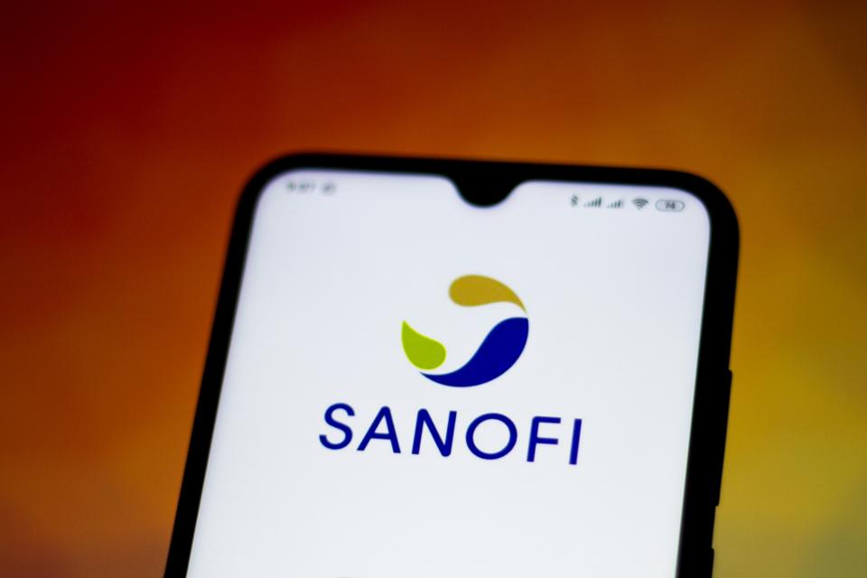 In this photo illustration Sanofi logo is seen displayed on...